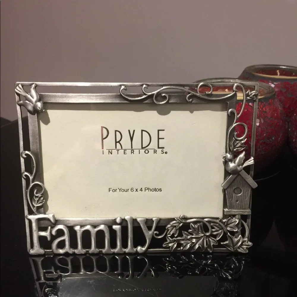 Two silver frames. Family and grandkids